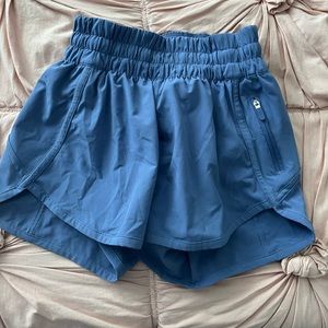 size 0 track that lululemon shorts in blue great condition